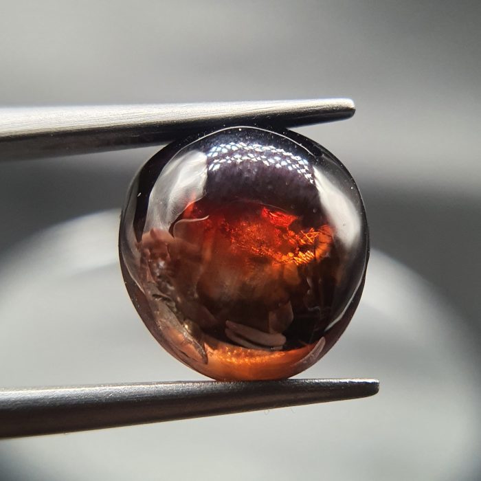 5.7 ct, Red Zircon (Jacinth) cabochon